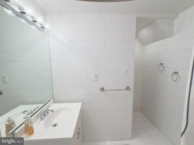 1828 Green St Unit 1R, Philadelphia, PA 19130 - bathroom with tile walls, tile patterned flooring, and vanity