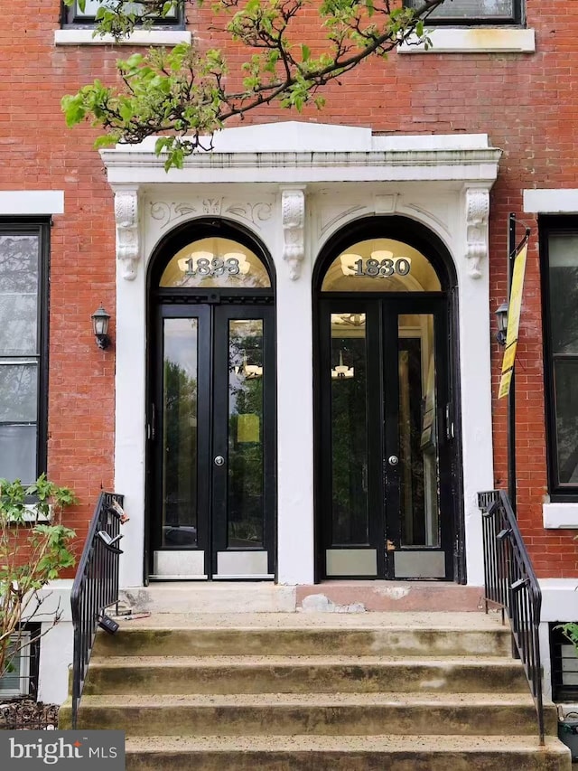 1828 Green St Unit 1R, Philadelphia, PA 19130 - doorway to property with french doors and brick siding