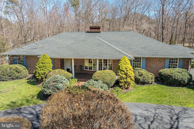 5983 Labs Run Ln, Penn Laird, VA 22846 - ranch-style house featuring brick siding, roof with shingles, a front yard, and a chimney
