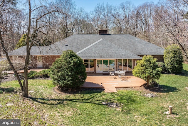 5983 Labs Run Ln, Penn Laird, VA 22846 - rear view of house featuring a wooden deck, roof with shingles, a chimney, brick siding, and a lawn