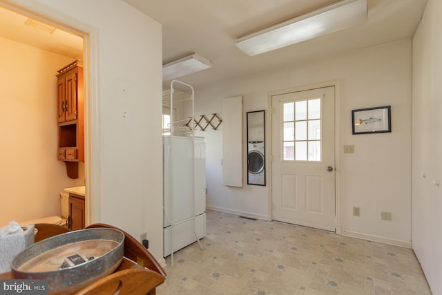 5983 Labs Run Ln, Penn Laird, VA 22846 - doorway featuring baseboards, washer / dryer, and light floors