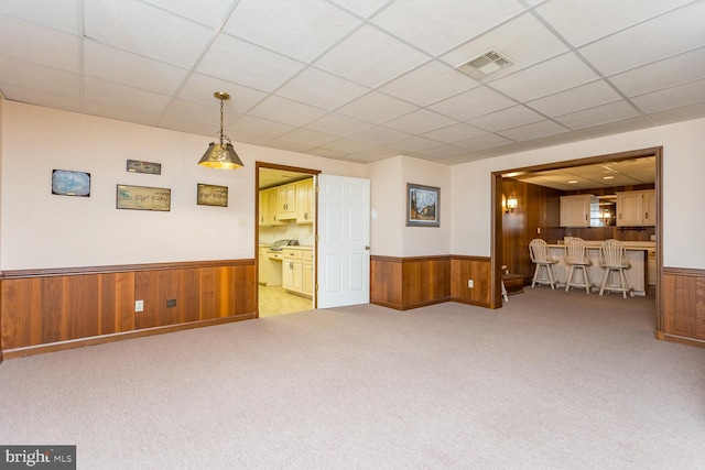 5983 Labs Run Ln, Penn Laird, VA 22846 - unfurnished living room with wood walls, a paneled ceiling, and a wainscoted wall