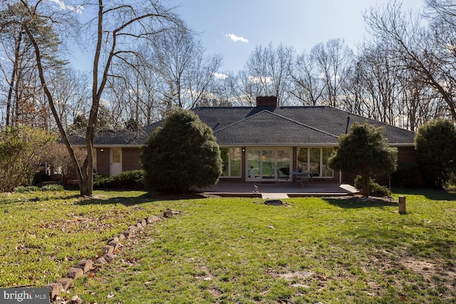 5983 Labs Run Ln, Penn Laird, VA 22846 - rear view of house with brick siding, a shingled roof, a yard, and a chimney