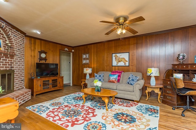 5983 Labs Run Ln, Penn Laird, VA 22846 - living room with ceiling fan, a fireplace, wood walls, wood finished floors, and ornamental molding