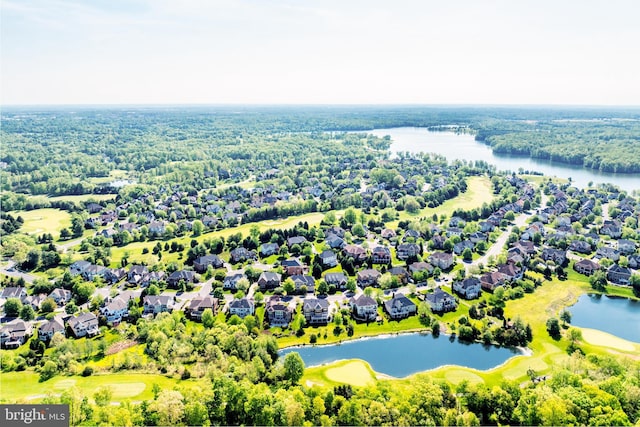 bird's eye view featuring a residential view, a water view, and golf course view