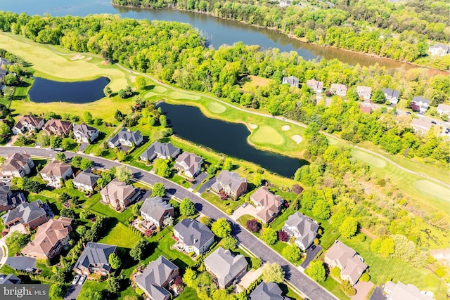 birds eye view of property featuring a residential view, view of golf course, and a water view