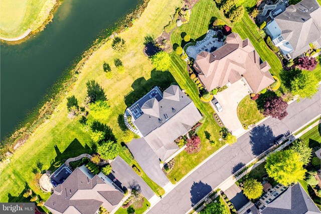 aerial view featuring a residential view and a water view
