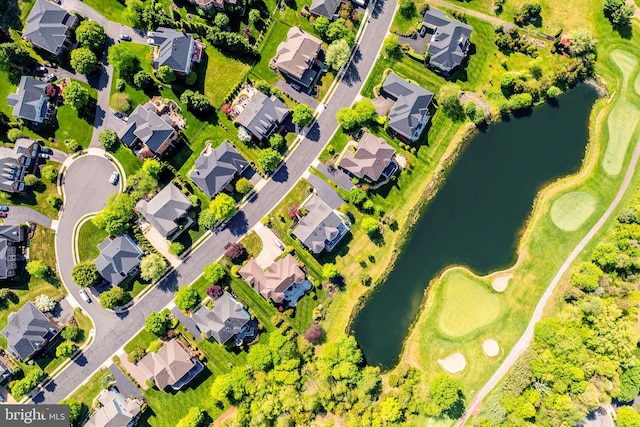 aerial view with a water view, golf course view, and a residential view