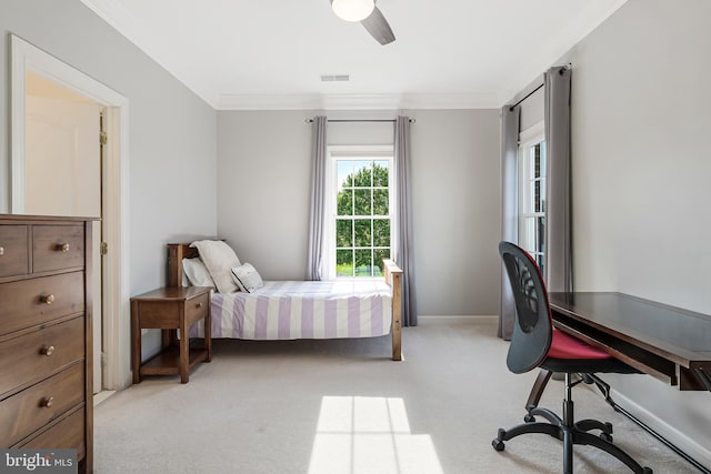 bedroom featuring baseboards, ornamental molding, light carpet, and visible vents