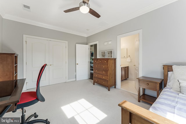 bedroom with visible vents, crown molding, a closet, light carpet, and ceiling fan