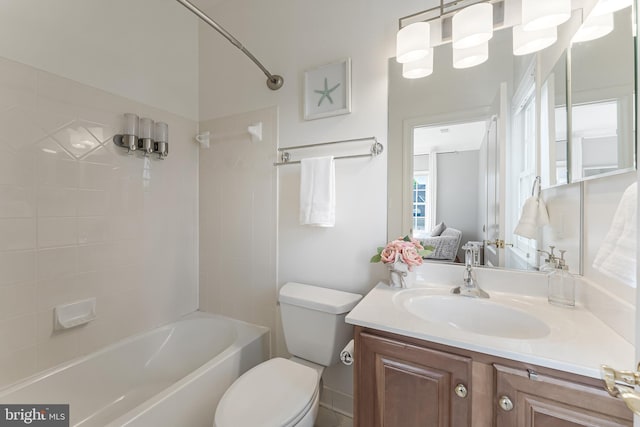 full bath featuring vanity, shower / bath combination, and toilet