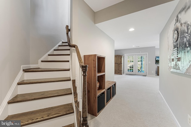 staircase featuring baseboards, carpet, french doors, and recessed lighting