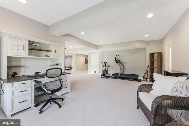 office with built in study area, baseboards, light carpet, and recessed lighting