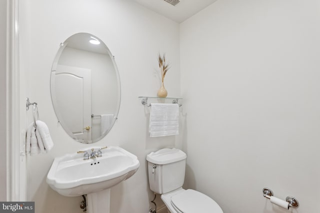 8810 Primula Dr, Laytonsville, MD 20882 - half bathroom with toilet and a sink
