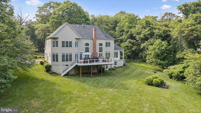 8810 Primula Dr, Laytonsville, MD 20882 - rear view of property featuring a wooden deck, a yard, stairs, a chimney, and a shingled roof
