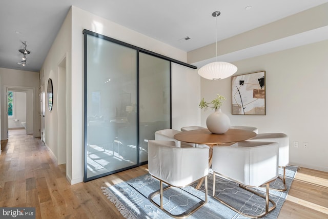 1224 11th St NW Unit 3, Washington, DC 20001 - dining space featuring baseboards, visible vents, and wood finished floors