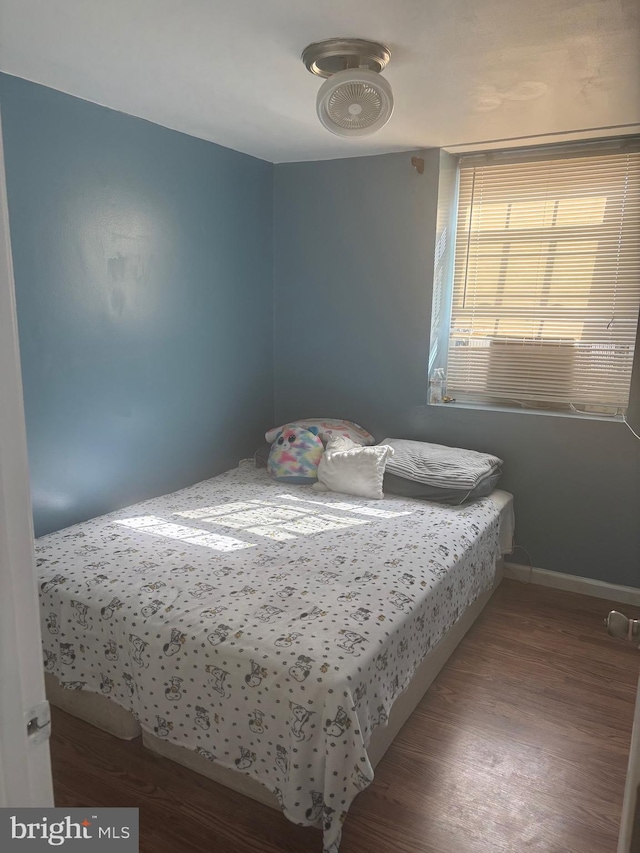 1852 Village Green Dr Unit E-122, Landover, MD 20785 - bedroom featuring baseboards and wood finished floors