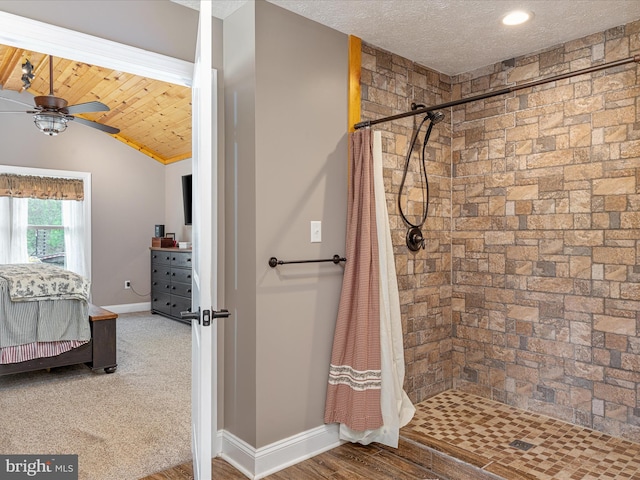 1996 Buck Mountain Rd, Bentonville, VA 22610 - full bath with baseboards, a ceiling fan, a tile shower, lofted ceiling, and ensuite bath