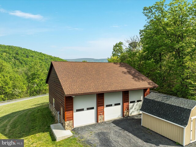 1996 Buck Mountain Rd, Bentonville, VA 22610 - detached garage with a wooded view