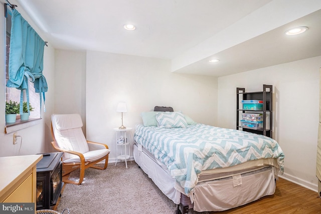 bedroom with recessed lighting and baseboards