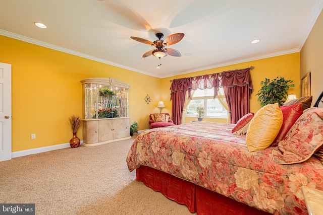 carpeted bedroom featuring baseboards, recessed lighting, ceiling fan, and crown molding