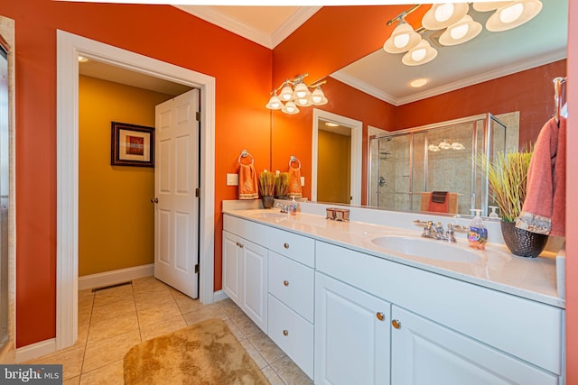 full bath with a sink, a stall shower, double vanity, ornamental molding, and tile patterned flooring
