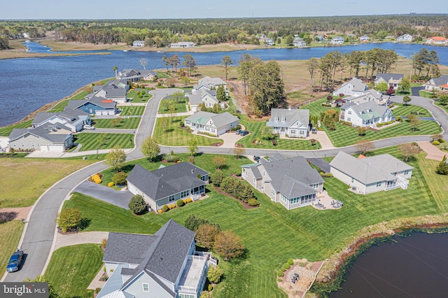 aerial view featuring a residential view and a water view