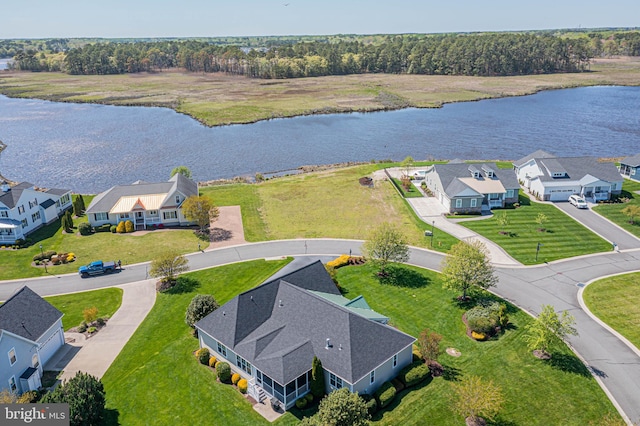 birds eye view of property featuring a residential view and a water view