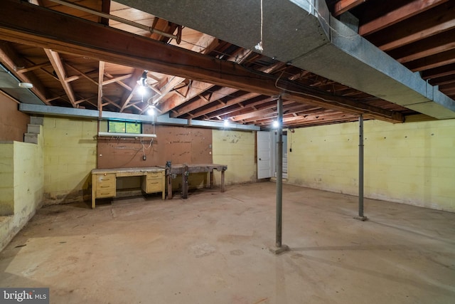 below grade area with a workshop area