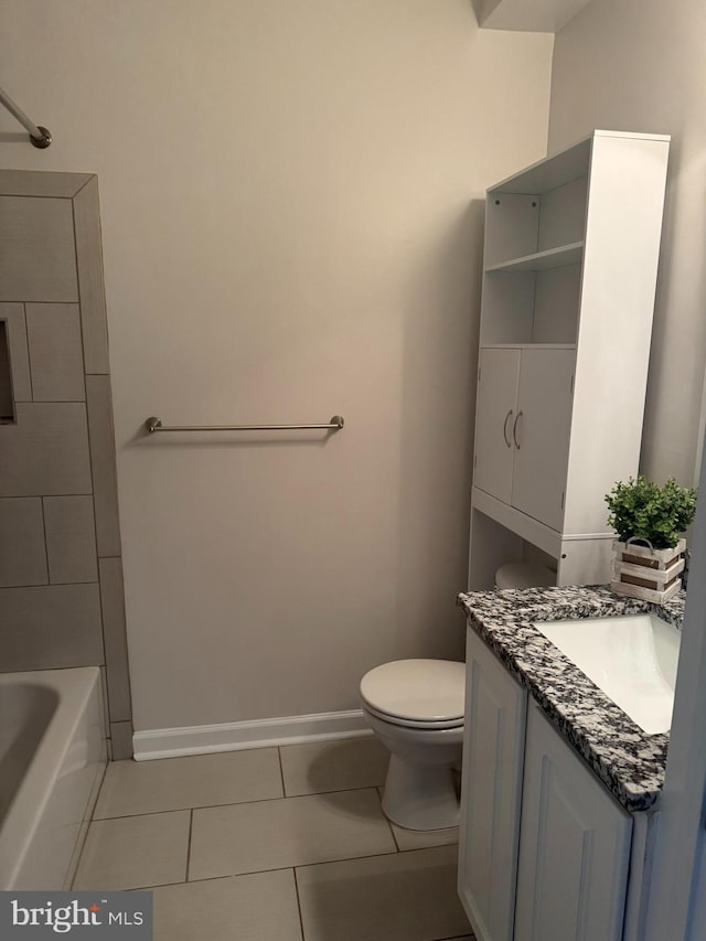 42429 Rockrose Sq, Brambleton, VA 20148 - bathroom featuring tile patterned floors, vanity, toilet, and baseboards