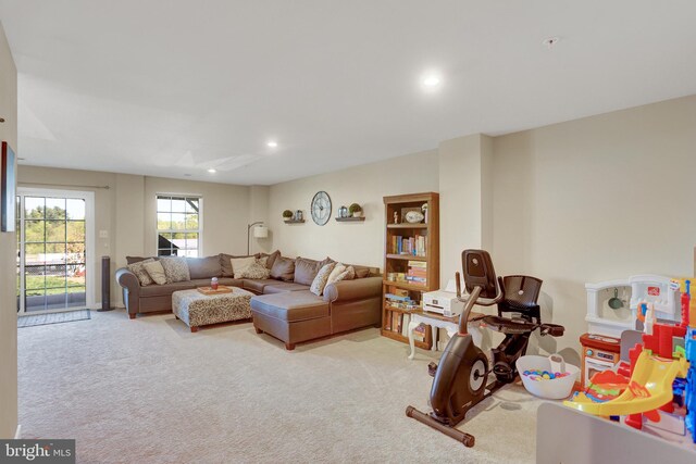 living room featuring carpet flooring and recessed lighting