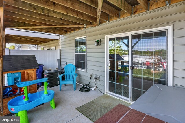 view of patio featuring central AC unit