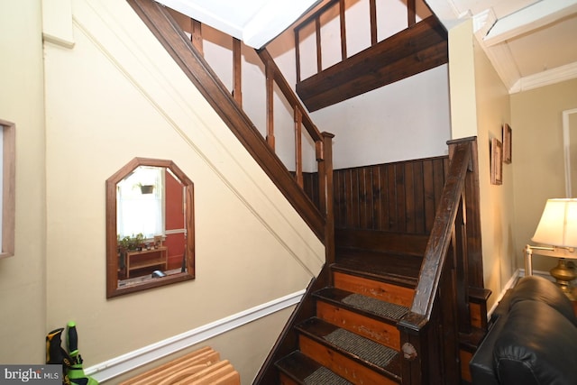 staircase with ornamental molding