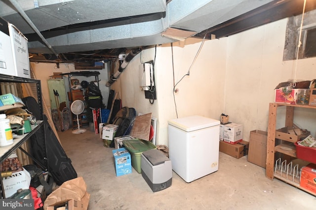 unfinished below grade area with fridge