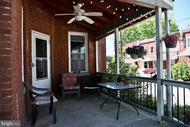 exterior space with ceiling fan