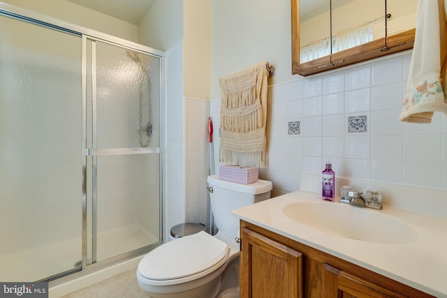 5054 Kenilworth Ave, Hyattsville, MD 20781 - full bathroom with toilet, a stall shower, tile walls, and vanity