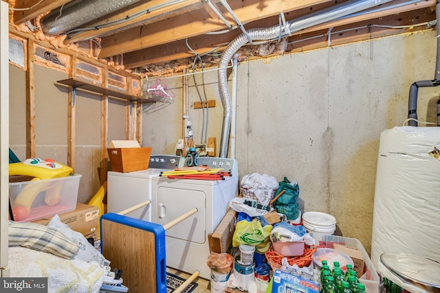 5054 Kenilworth Ave, Hyattsville, MD 20781 - unfinished below grade area featuring washing machine and dryer