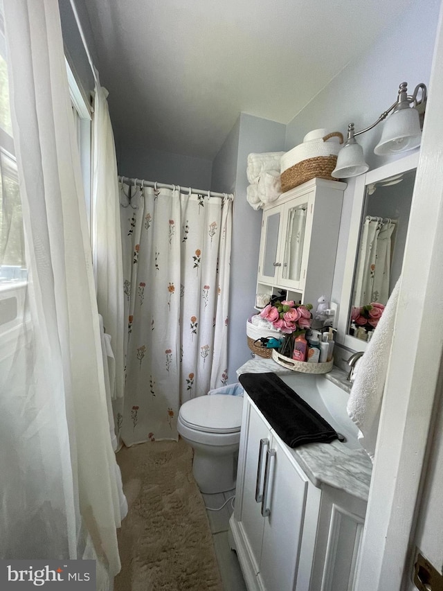 8807 Doug Dr, Nokesville, VA 20181 - full bathroom with vanity, tile patterned flooring, toilet, and a shower with curtain