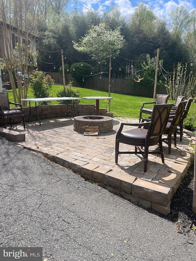 8807 Doug Dr, Nokesville, VA 20181 - view of patio with a fire pit