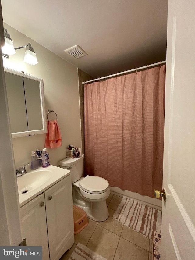 8807 Doug Dr, Nokesville, VA 20181 - bathroom with visible vents, tile patterned flooring, toilet, and vanity