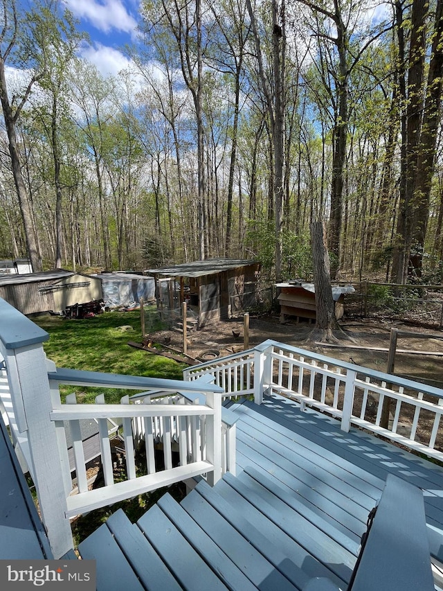 8807 Doug Dr, Nokesville, VA 20181 - deck featuring a lawn and an outdoor structure