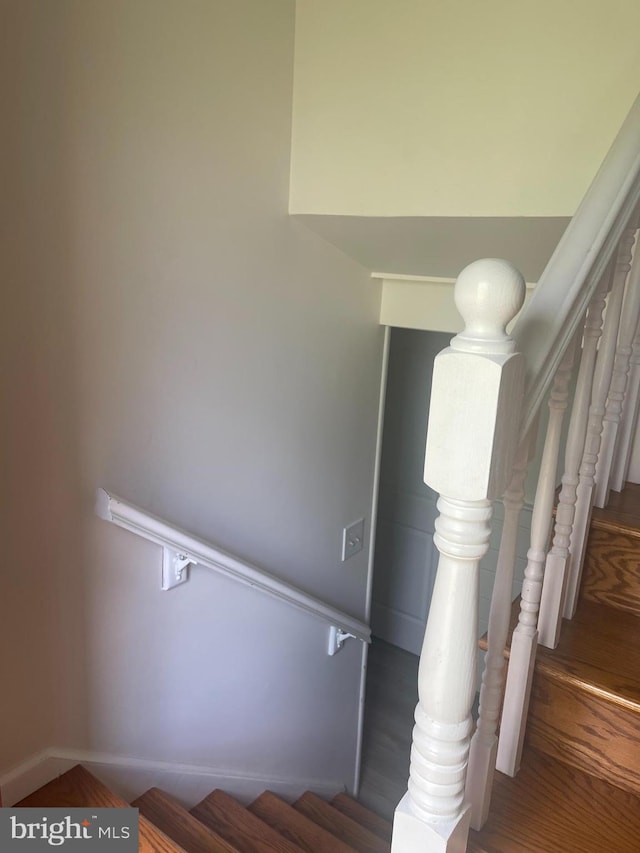 8807 Doug Dr, Nokesville, VA 20181 - stairs featuring baseboards and wood finished floors