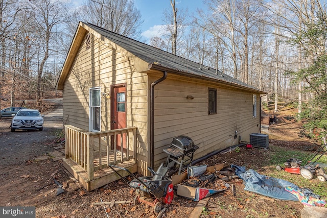 view of outdoor structure featuring central AC