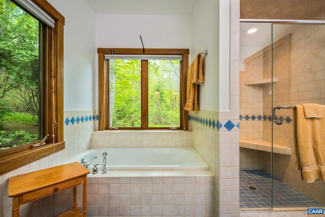 4547 Taylor Creek Rd, Afton, VA 22920 - full bathroom with tile walls, a shower stall, and a garden tub