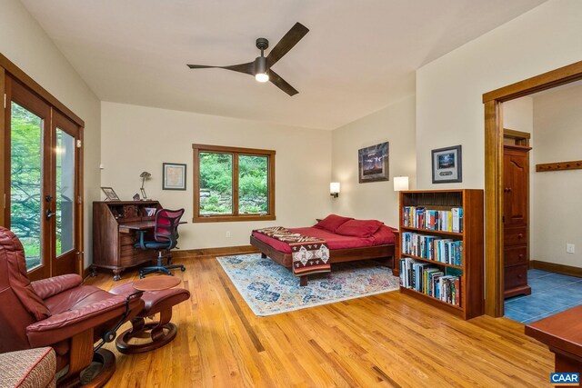 4547 Taylor Creek Rd, Afton, VA 22920 - living area with wood finished floors, a healthy amount of sunlight, a ceiling fan, and baseboards