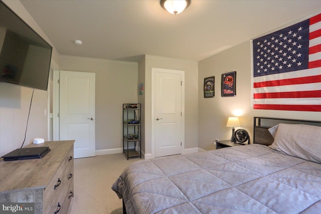 carpeted bedroom with baseboards