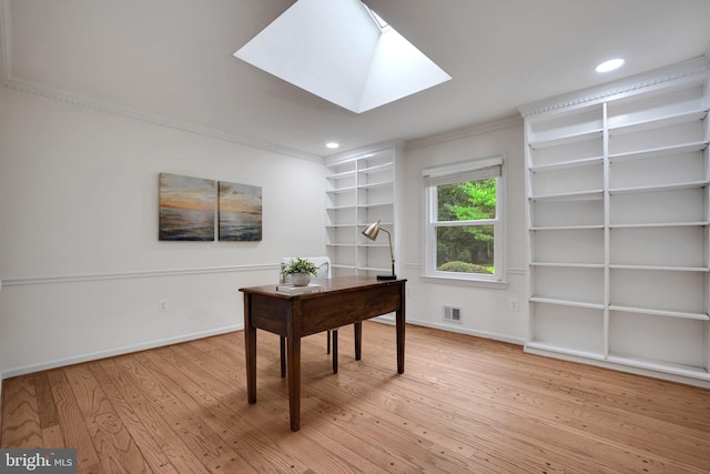 2407 Mare Ln, Oakton, VA 22124 - home office featuring light wood-type flooring, baseboards, crown molding, recessed lighting, and a skylight