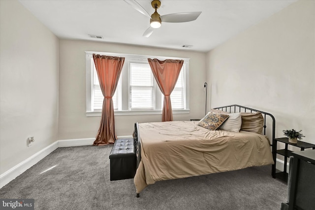 bedroom with baseboards, carpet, a ceiling fan, and visible vents