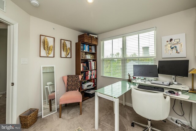home office with baseboards, carpet flooring, and visible vents