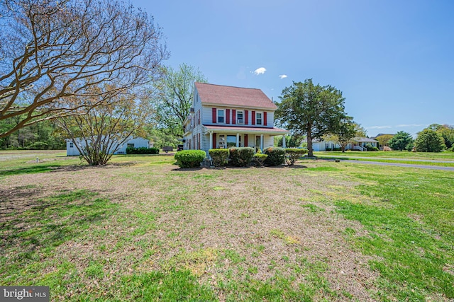 view of front facade with a front lawn